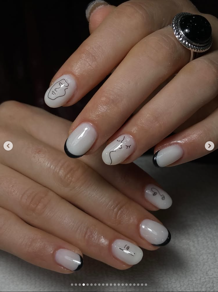 Unhas francesinha preta com arte de rosto